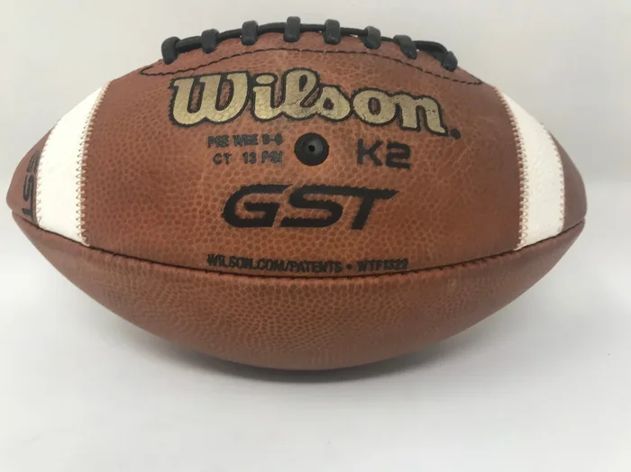 Used Wilson GST Leather Pee Wee Football Appropriate for ages 6-9